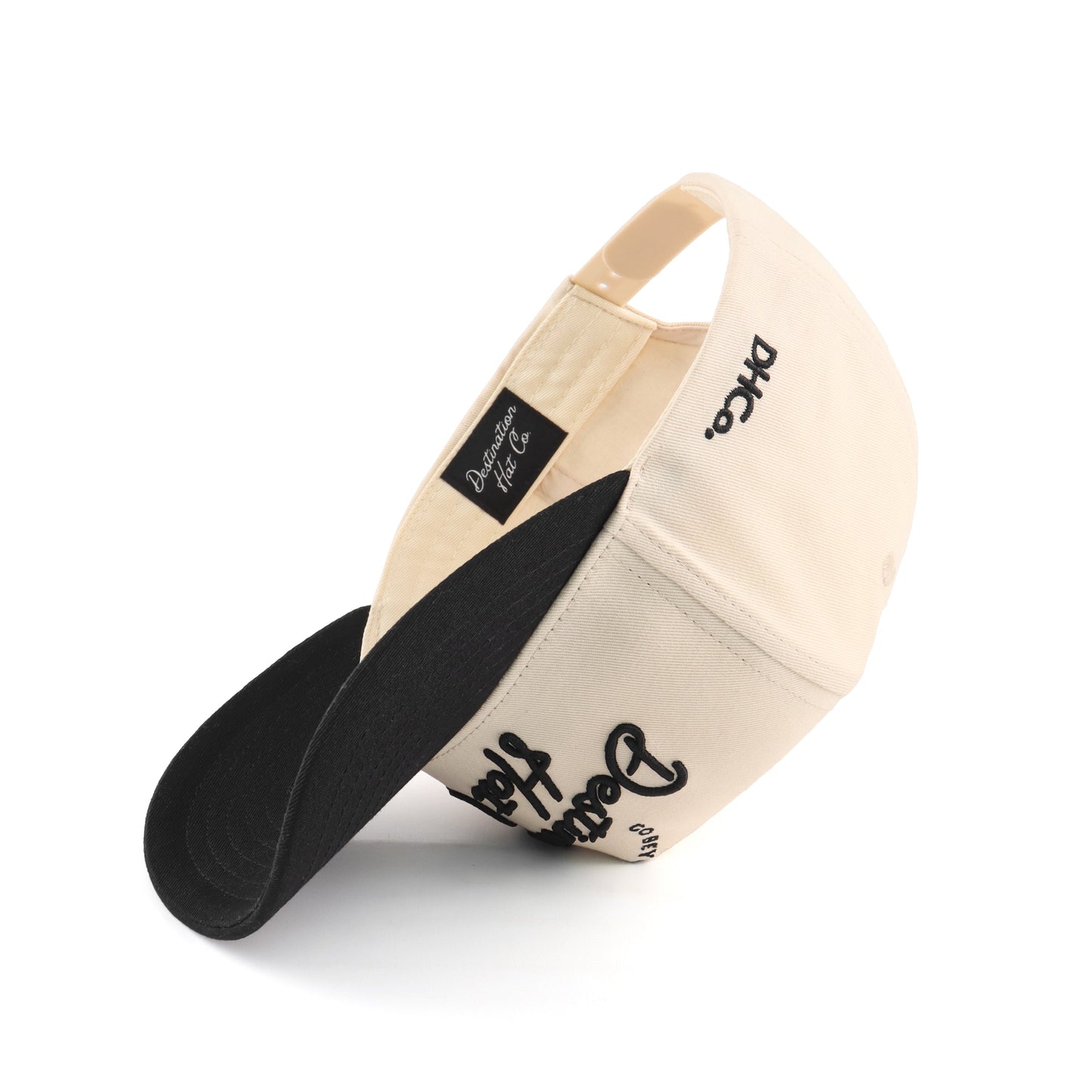 Destination Script Beige Pre-curved Trucker Hat Destination Hat Co.