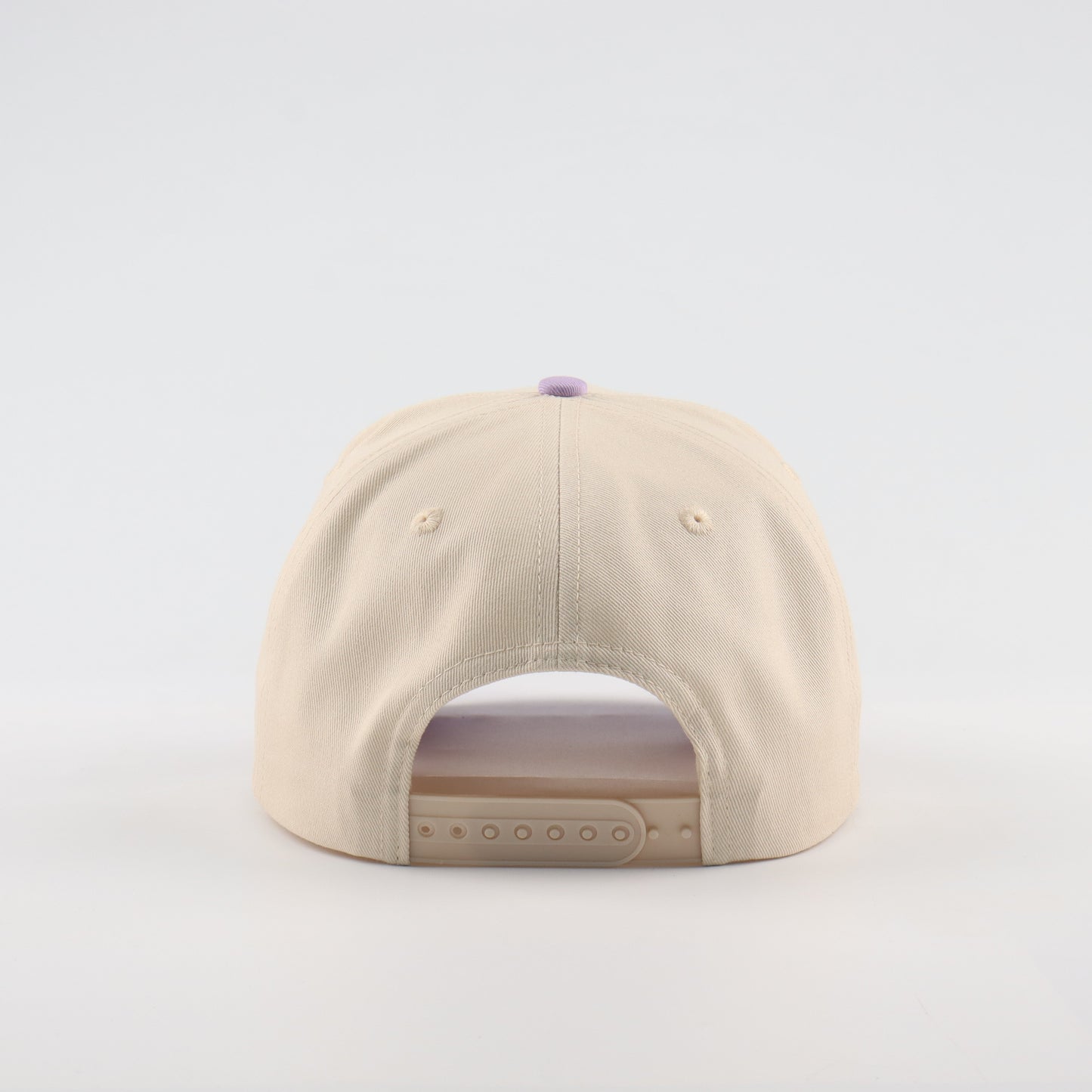 Nacogdoches Script Beige and Purple Pre-curved Trucker Hat
