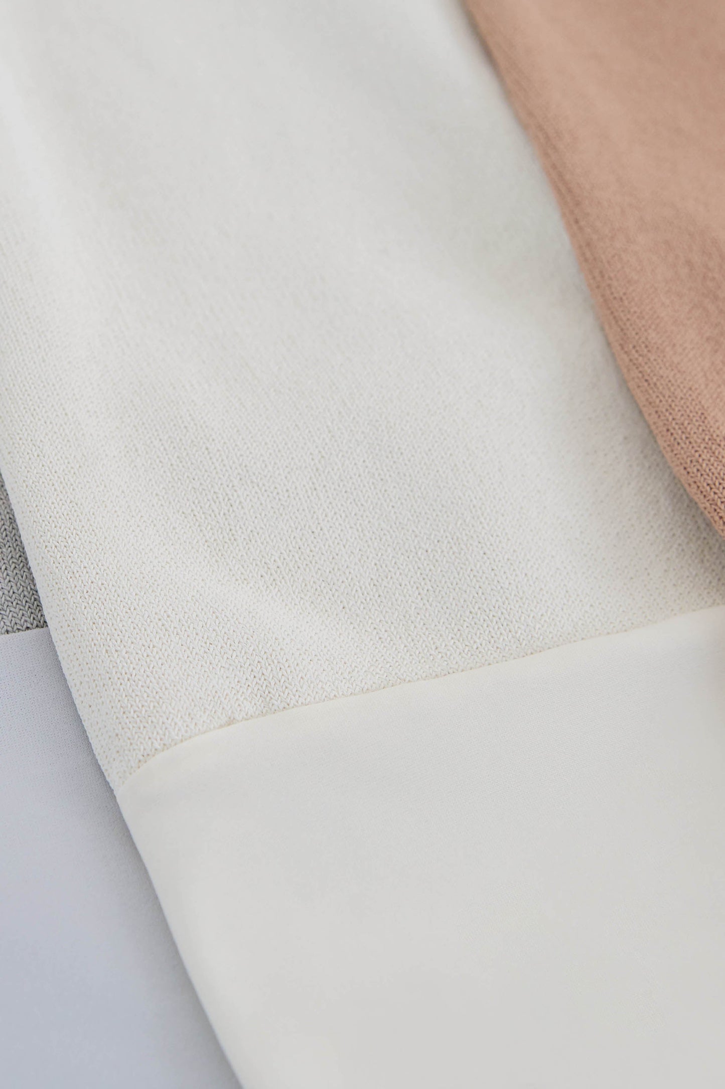 MIRA TURTLENECK VISCOSE BODYSUIT IN CREAM