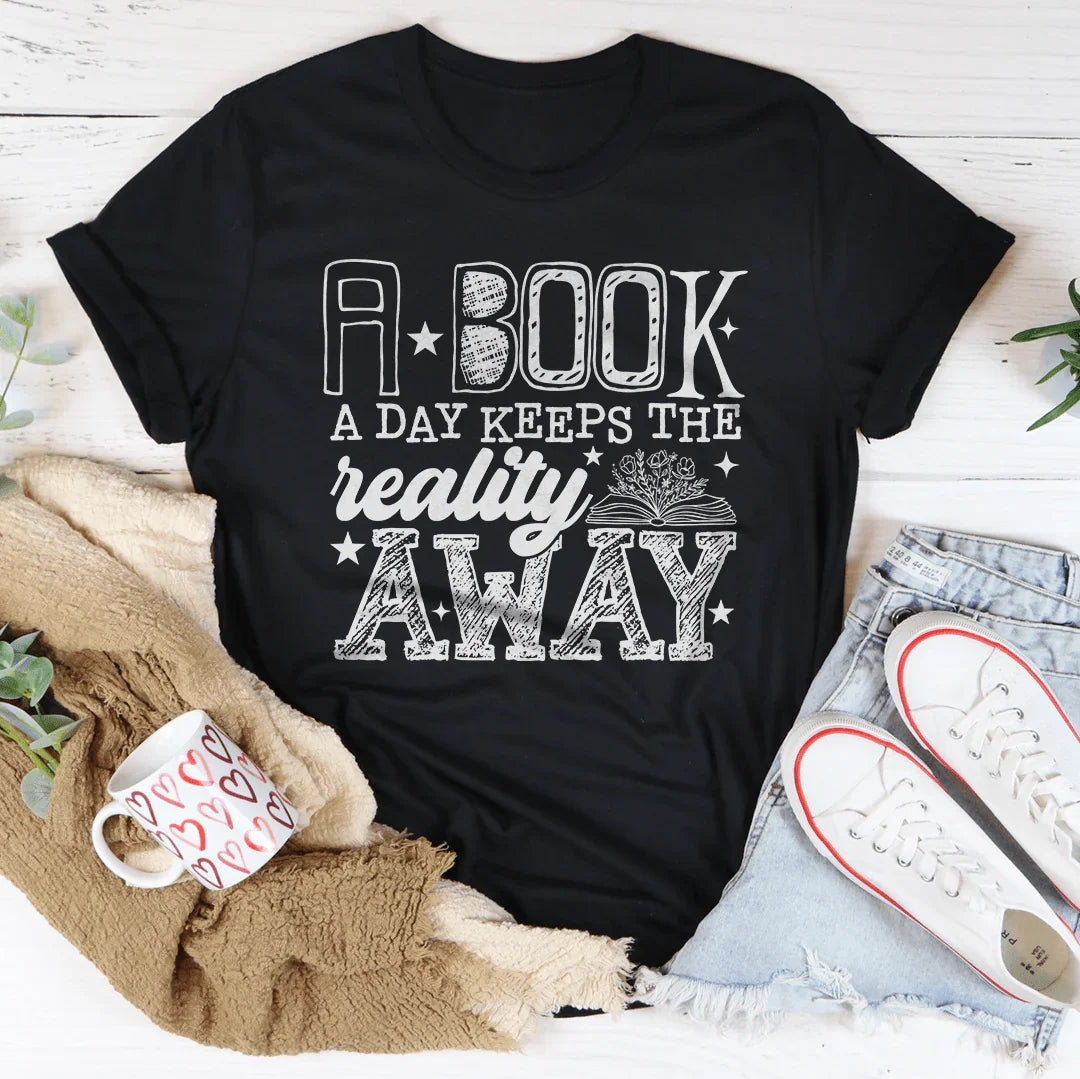 A Book A Day Keeps The Reality Away Tee Ultra-Soft Fabric T-Shirt Peachy Sunday