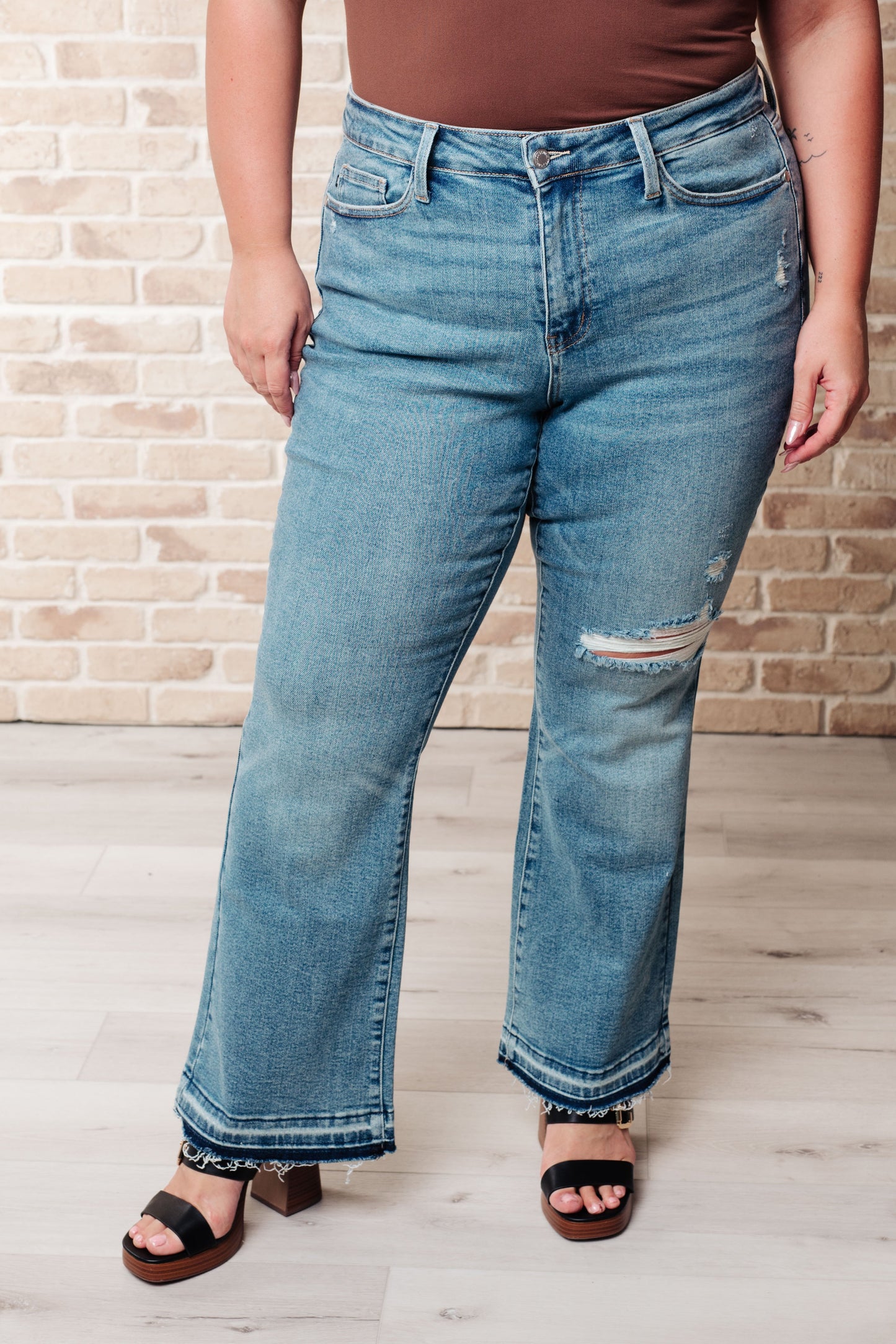 Mid Rise Distressed Released Hem Bootcut Jeans Judy Blue