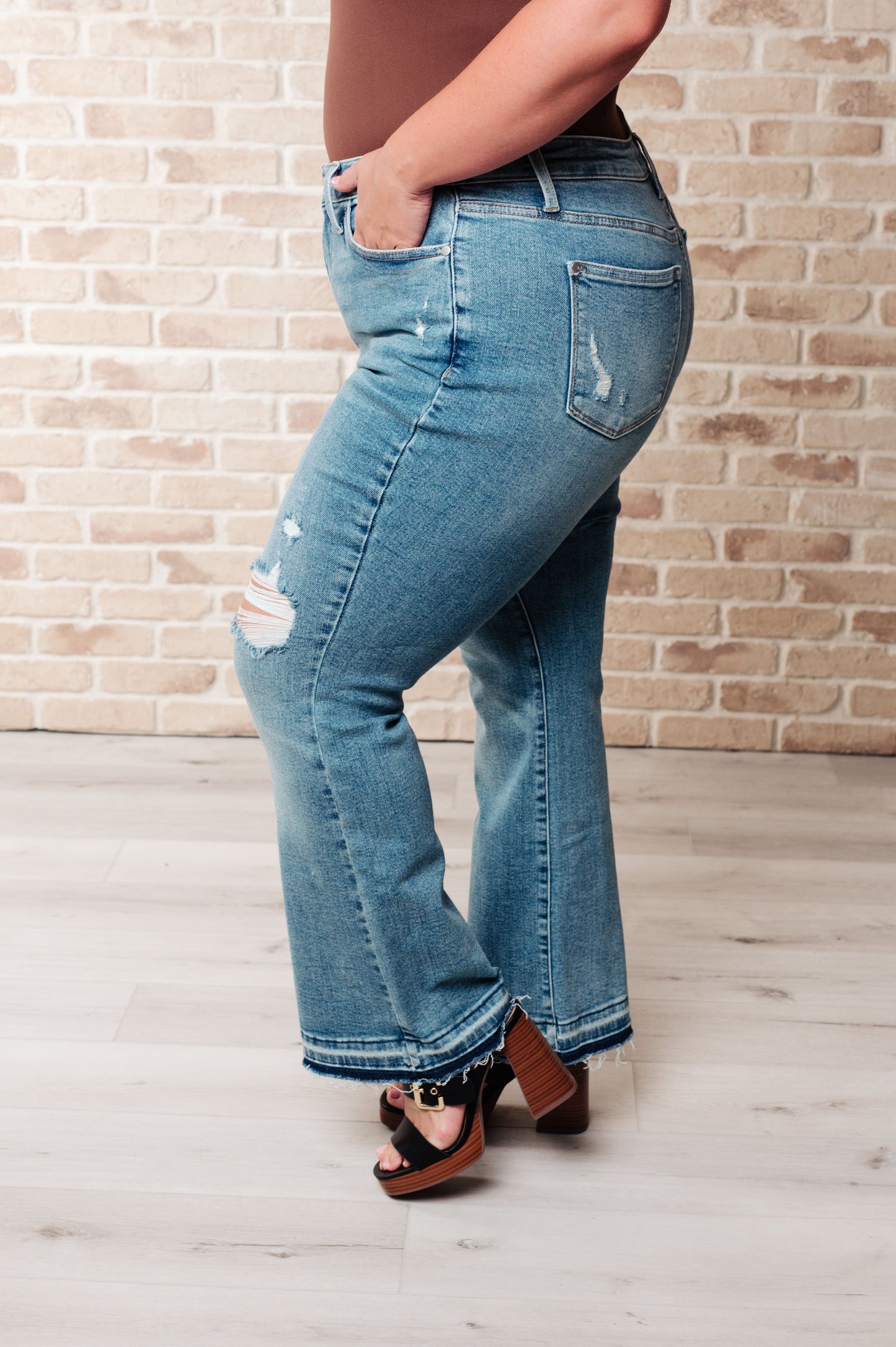 Mid Rise Distressed Released Hem Bootcut Jeans Judy Blue