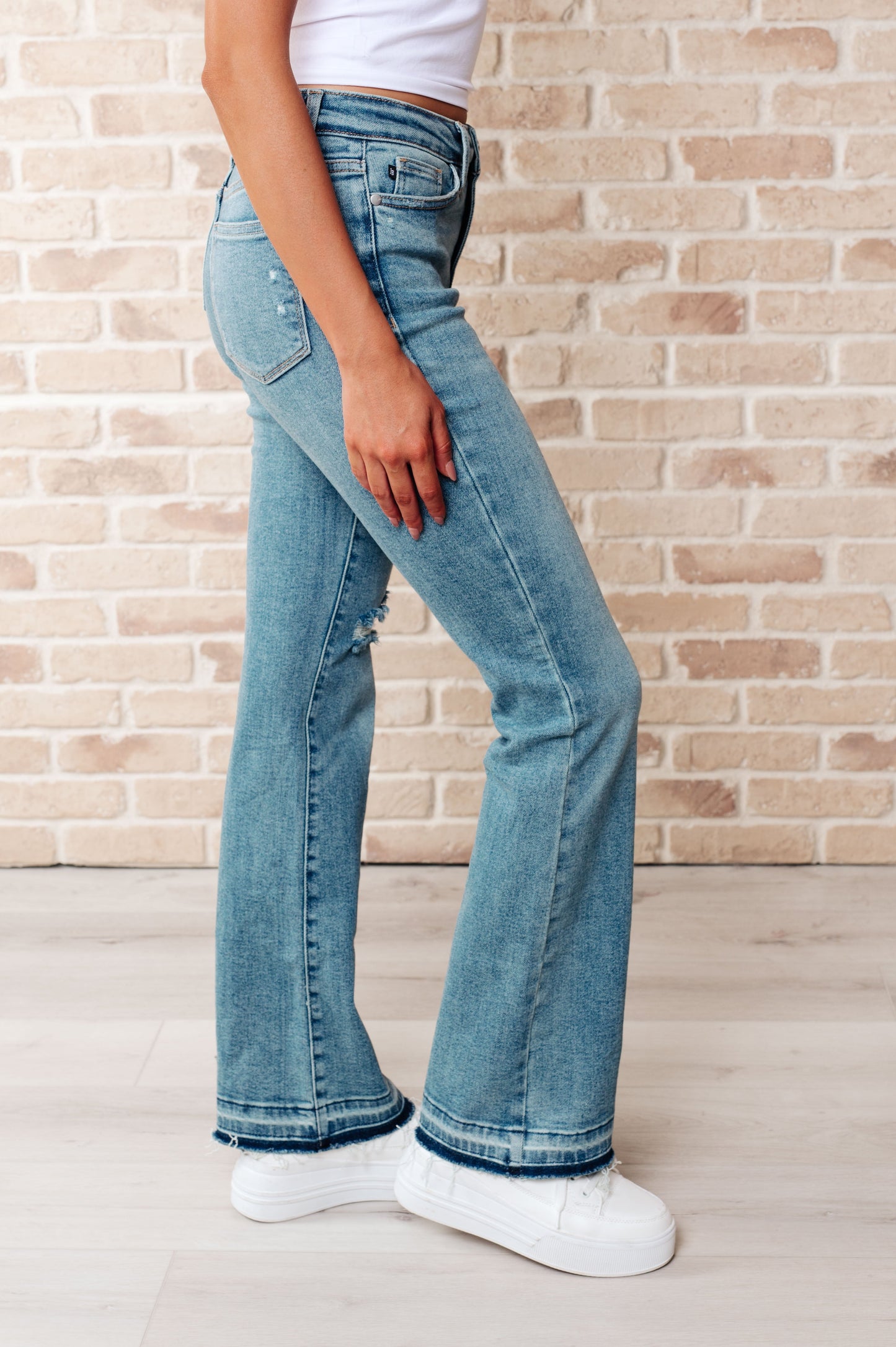 Mid Rise Distressed Released Hem Bootcut Jeans Judy Blue