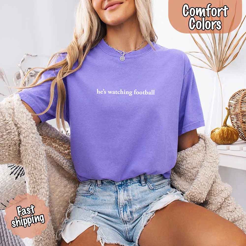 He's Watching Football Comfort Colors Funny Tee for Her
