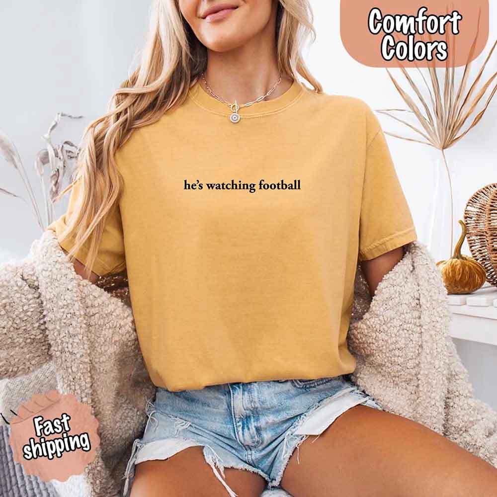 He's Watching Football Comfort Colors Funny Tee for Her