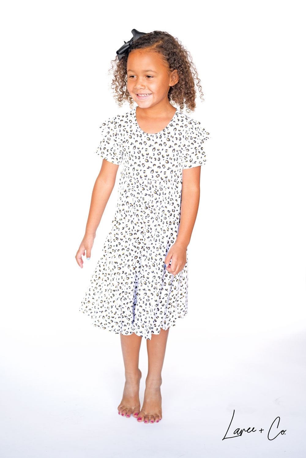 Leopard Bamboo Ruffle Spin Dress Knee-length Short Sleeve Laree + Co.