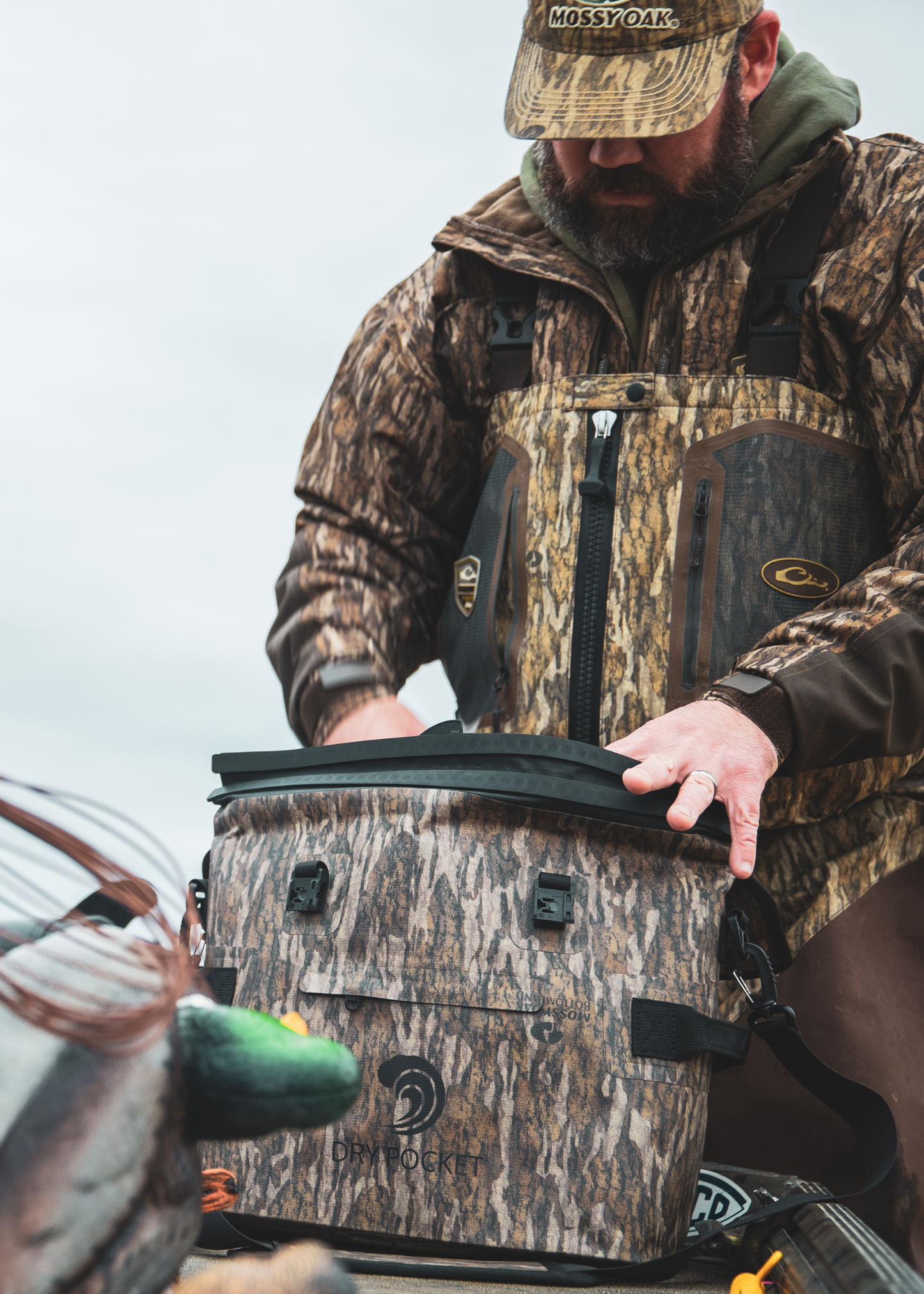 Mossy Oak - Auto-Sealing, Waterproof, Floating, Scent Proof Day-Pack Cooler