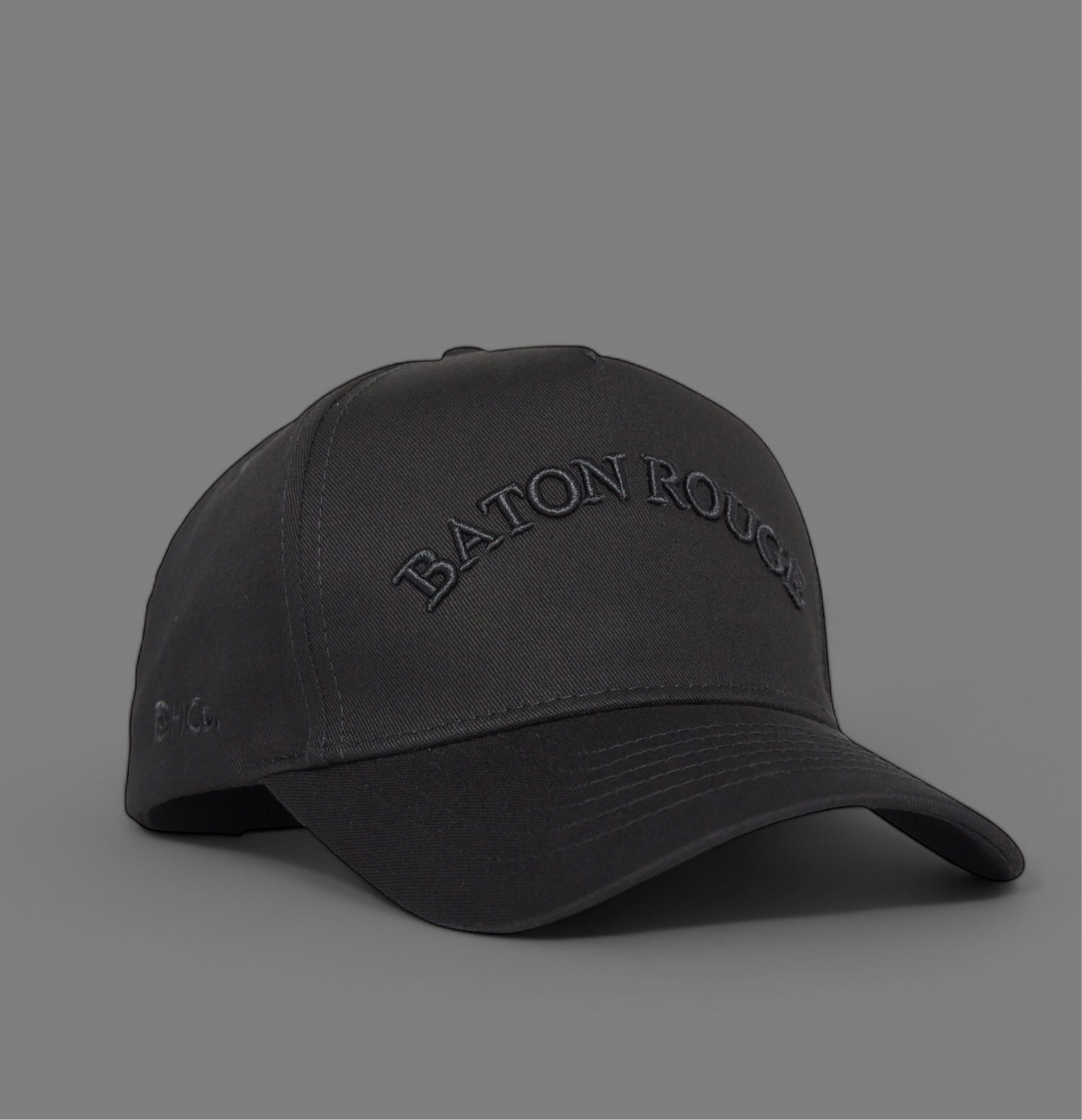 Midnight Collection Black Pre-curved Trucker Hat Baton Rouge