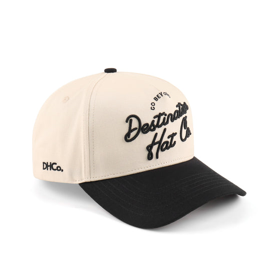 Destination Script Beige Pre-curved Trucker Hat Destination Hat Co.