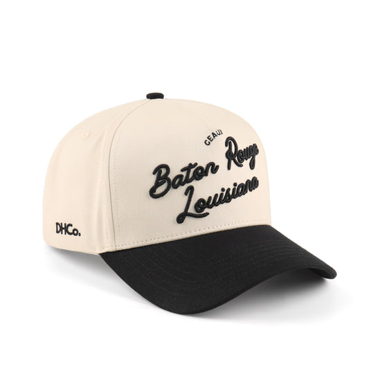Baton Rouge Script Beige and Black Pre-curved Trucker Hat Destination Hat Co.
