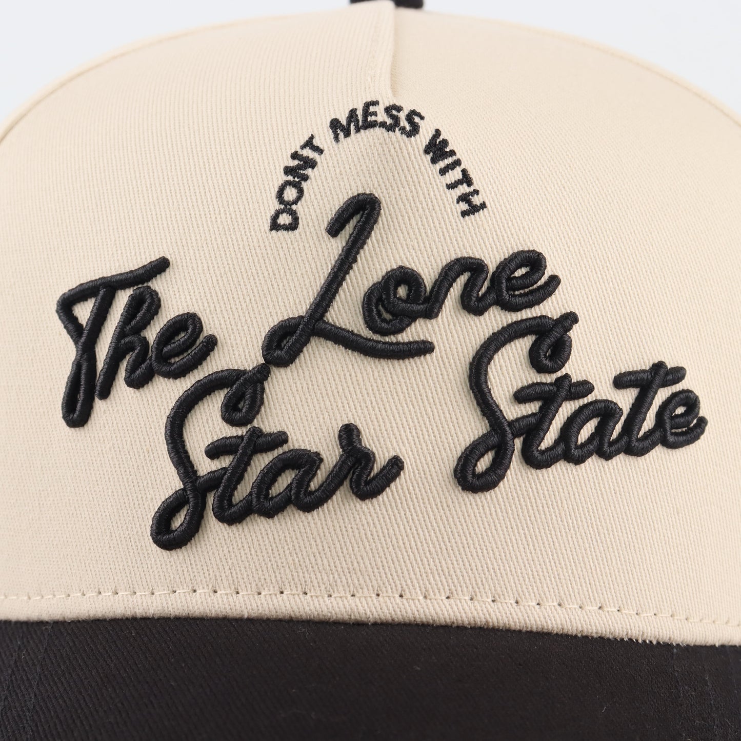 Lone Star Script Beige and Black Pre-curved Trucker Hat Destination Hat Co.