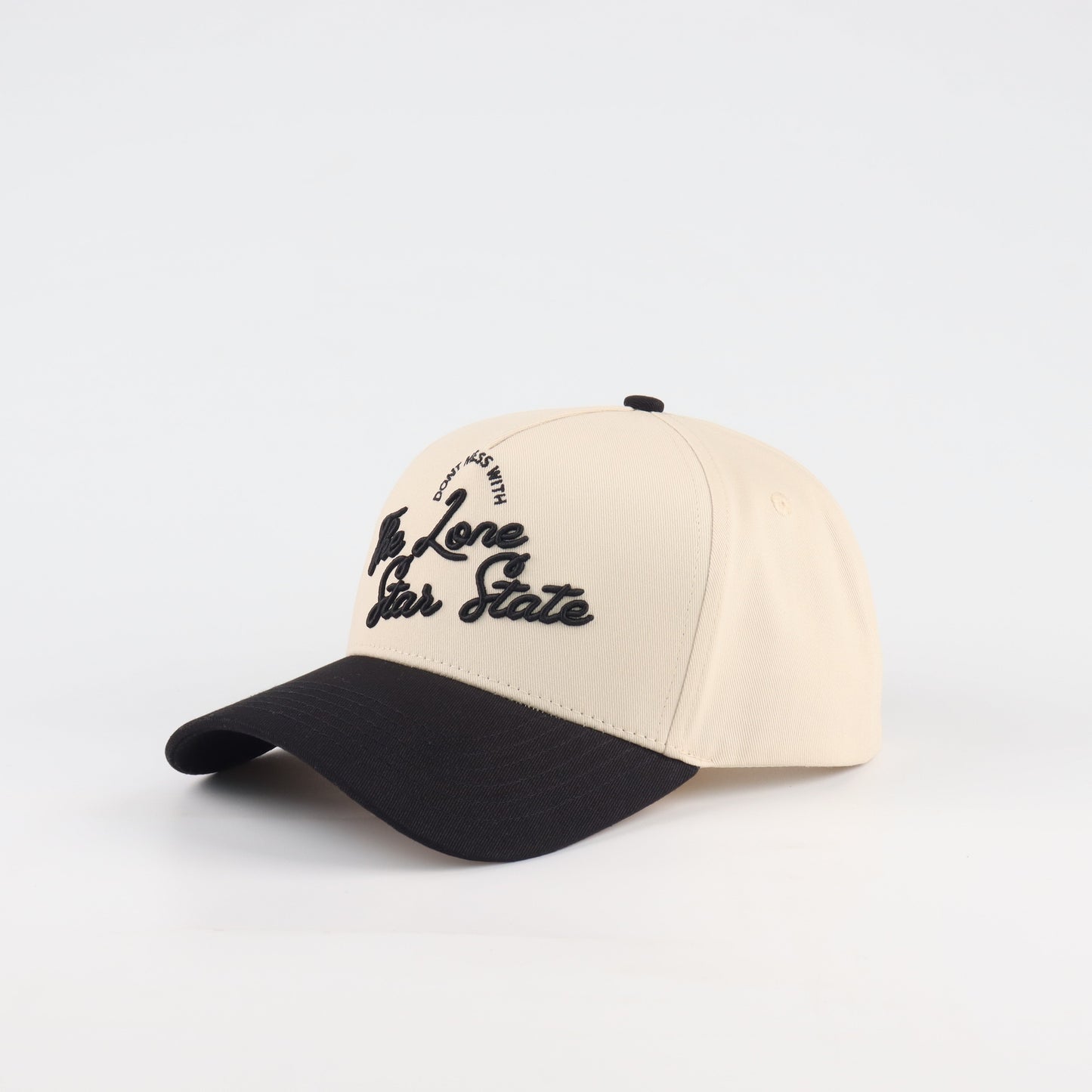 Lone Star Script Beige and Black Pre-curved Trucker Hat Destination Hat Co.
