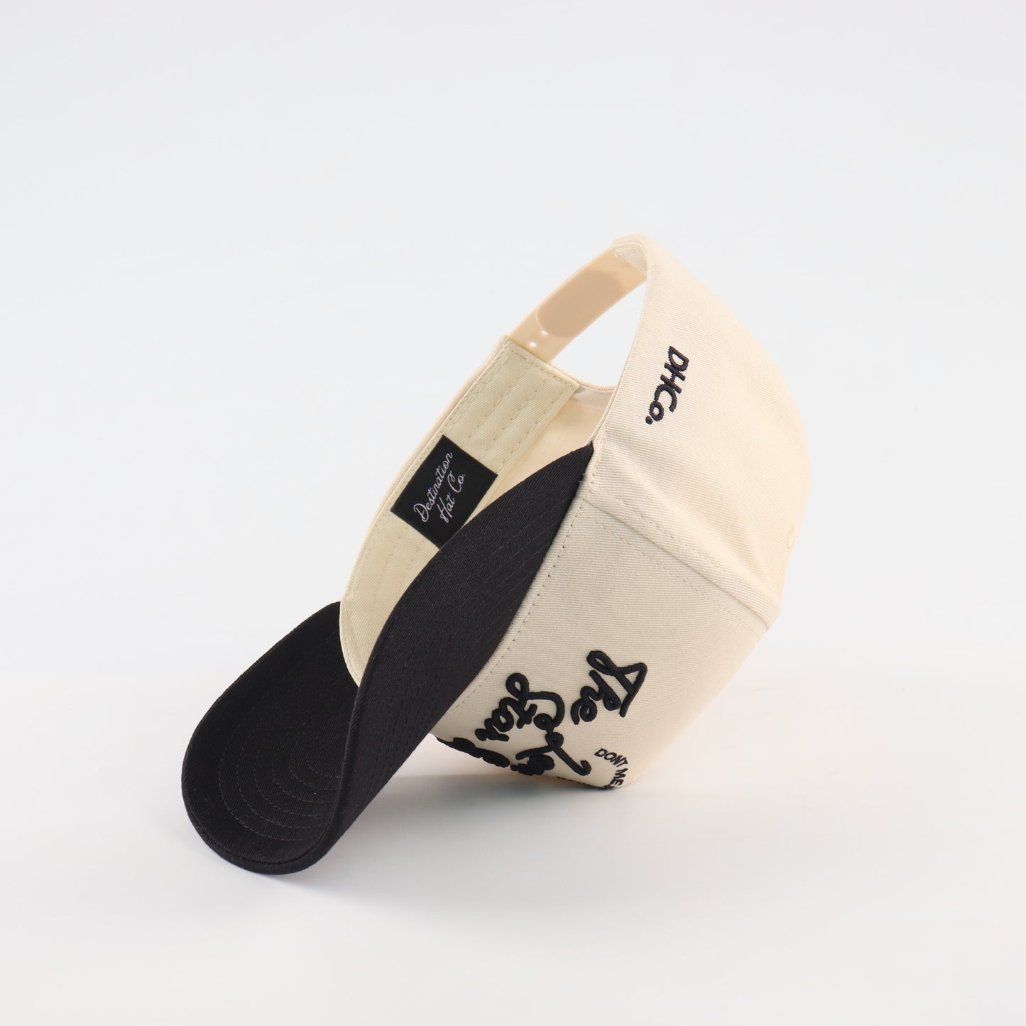 Lone Star Script Beige and Black Pre-curved Trucker Hat Destination Hat Co.