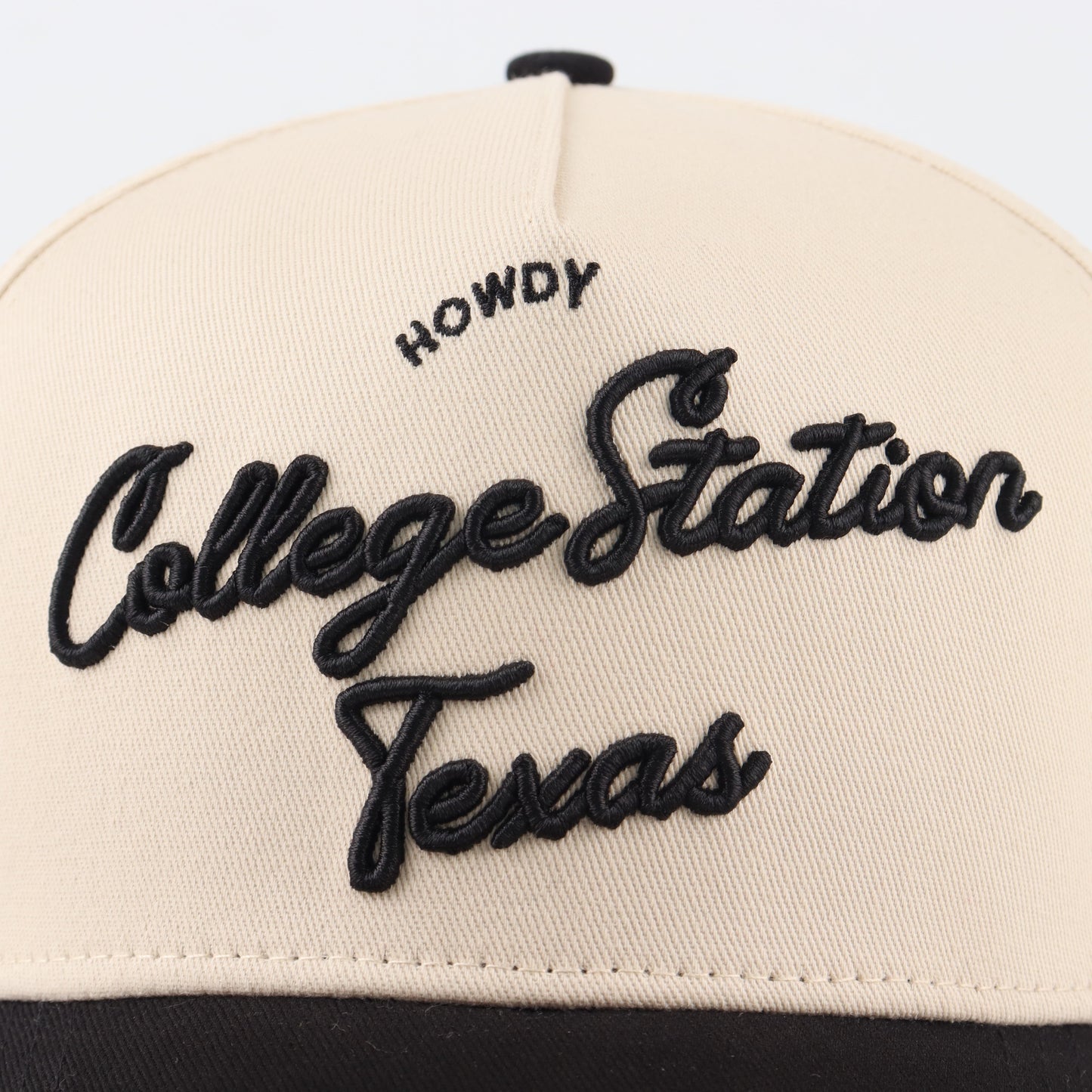 College Station Script Beige and Black Pre-curved Trucker Hat Destination Hat Co.