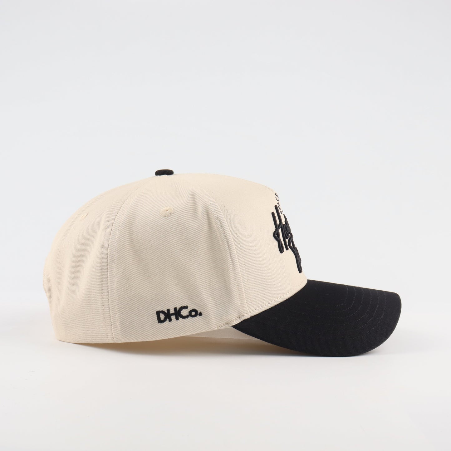Houston Script Beige and Black Pre-curved Trucker Hat Destination Hat Co.