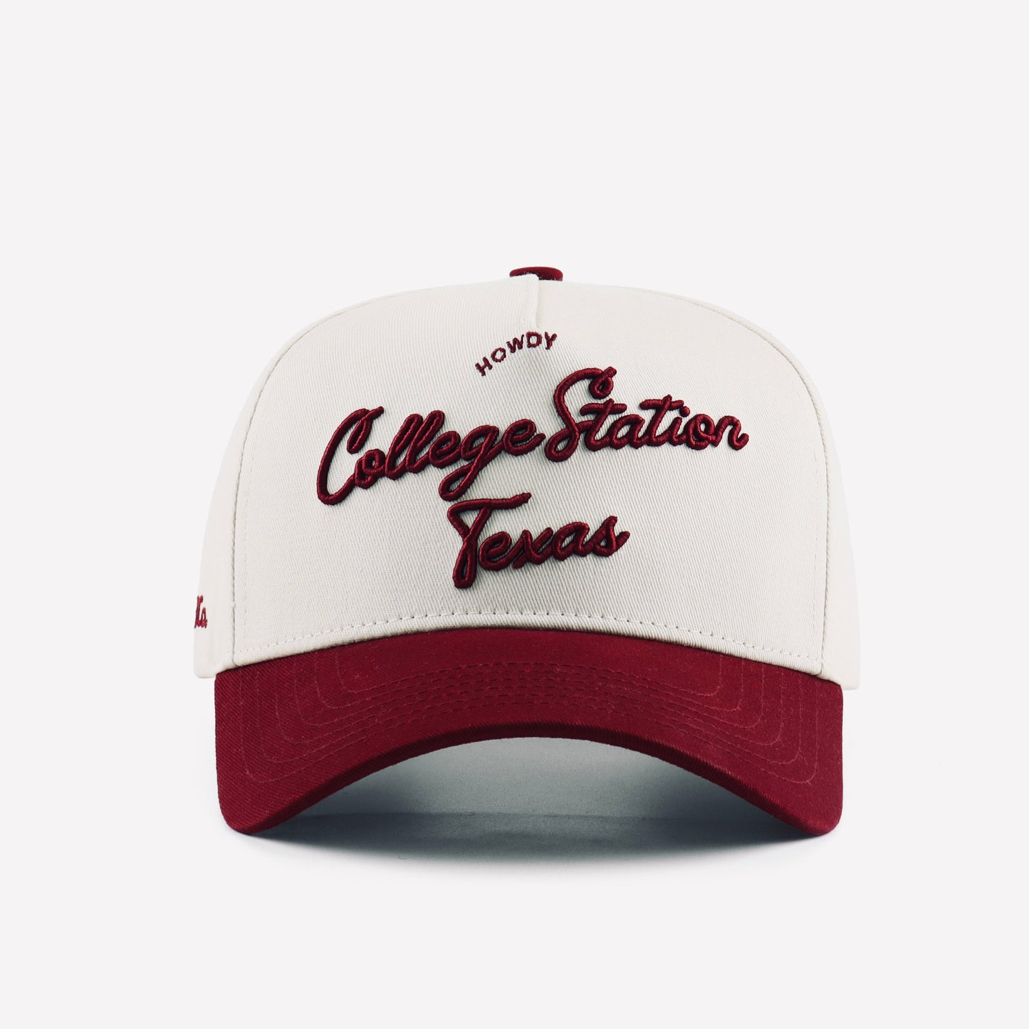 College Station Script Beige Maroon Pre-curved Trucker Hat Destination Hat Co.