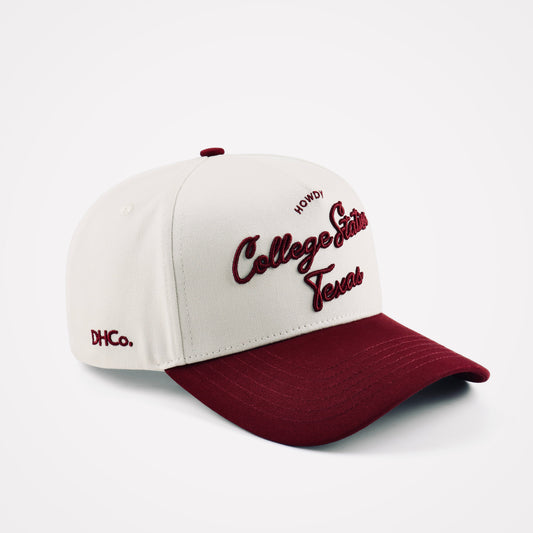 College Station Script Beige Maroon Pre-curved Trucker Hat Destination Hat Co.