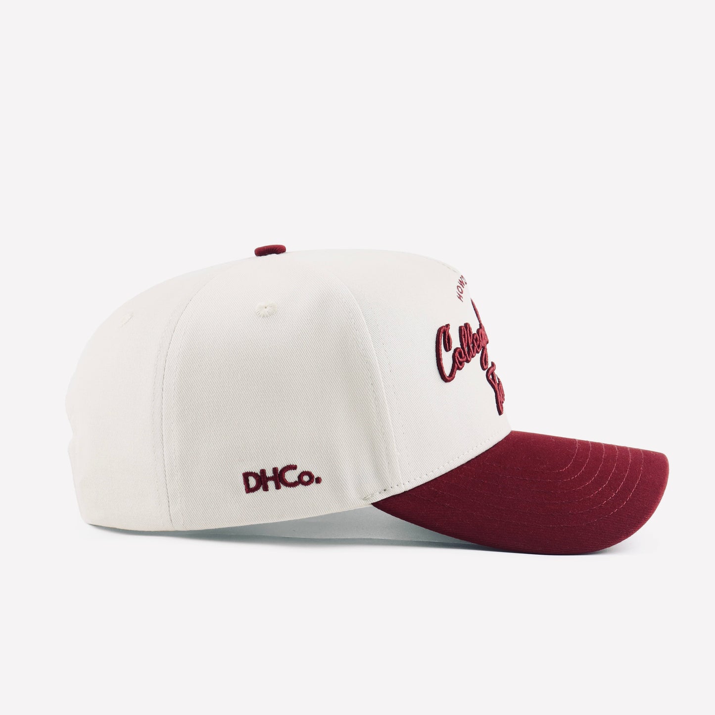 College Station Script Beige Maroon Pre-curved Trucker Hat Destination Hat Co.