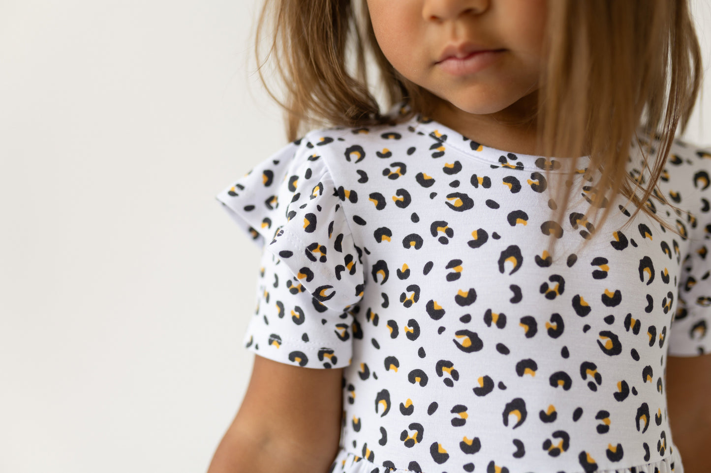Leopard Bamboo Ruffle Spin Dress Knee-length Short Sleeve Laree + Co.