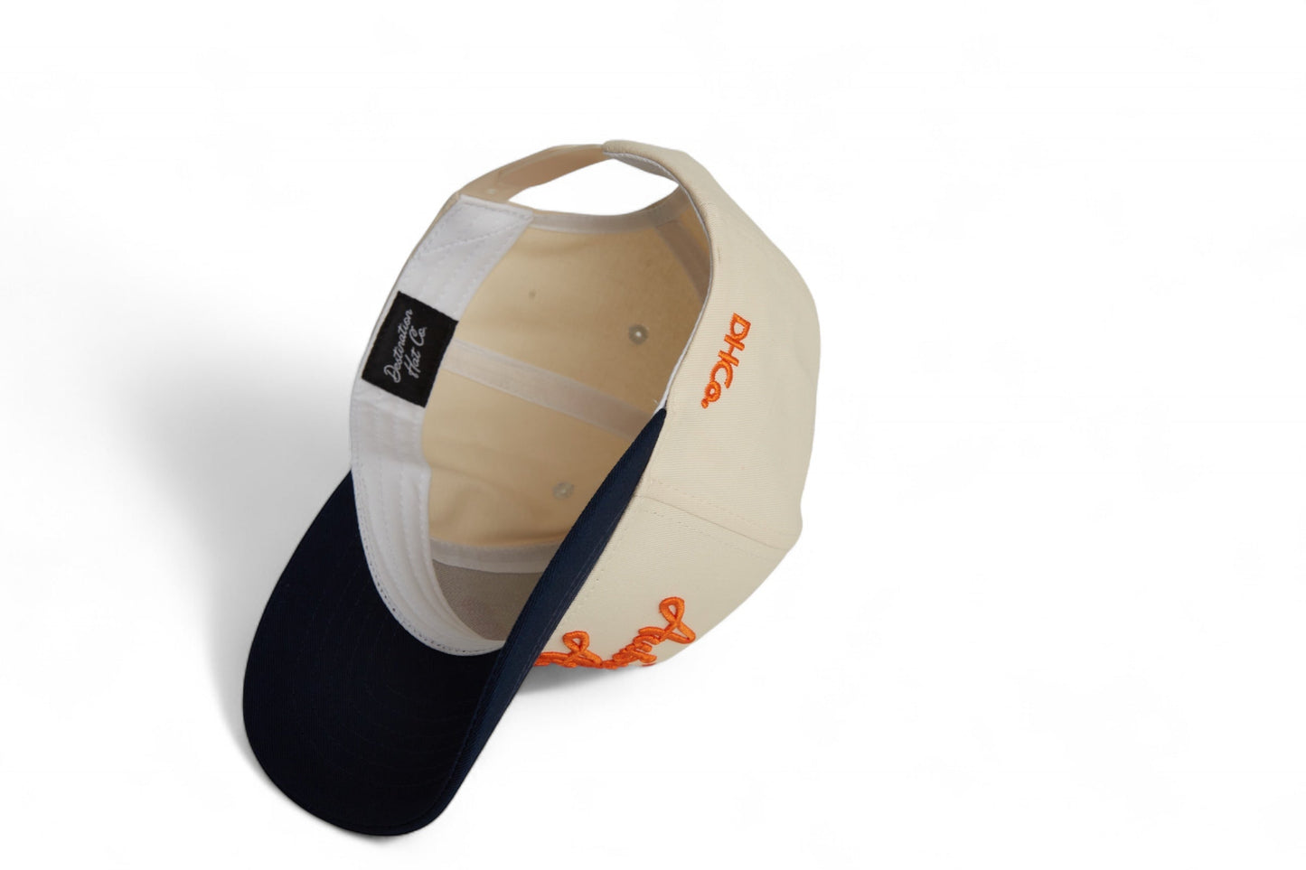 Script Auburn Pre-curved Trucker Hat Beige Blue EAGLE