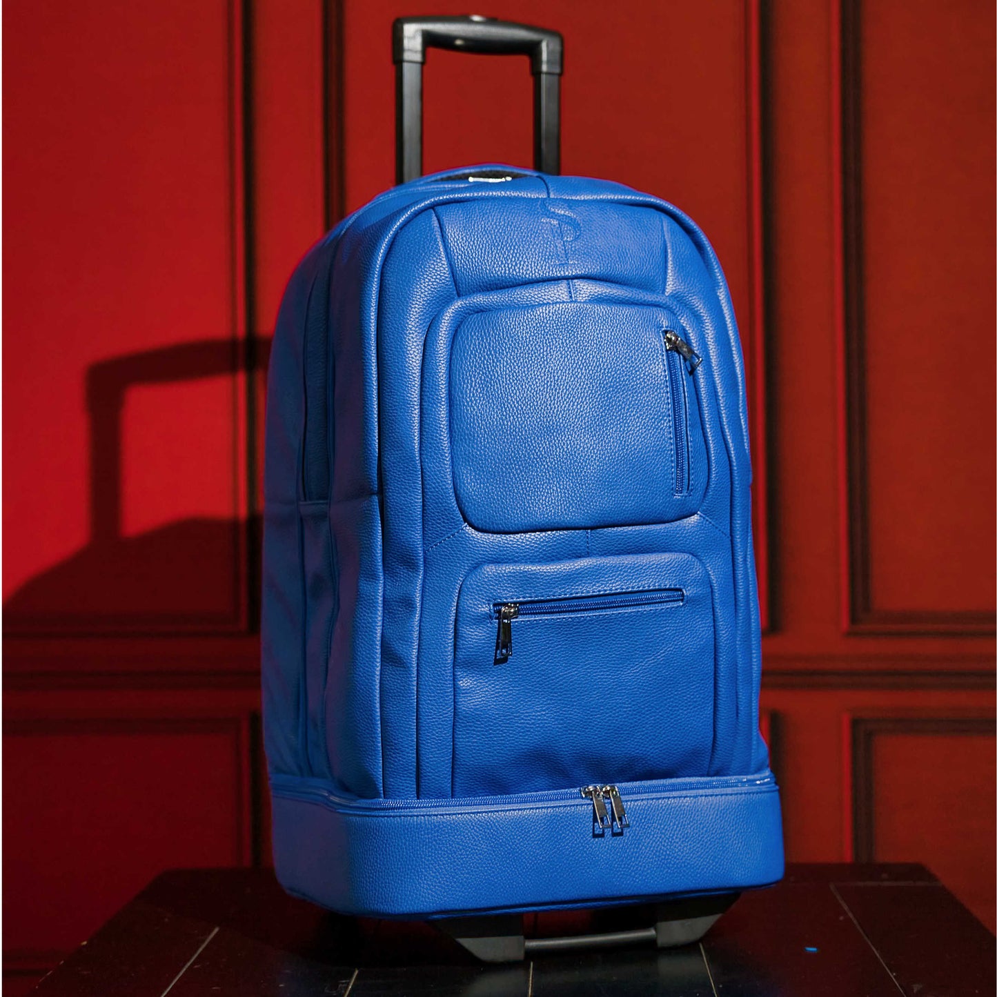Royal Blue Leather TSA-Approved Carry-On Roller Bag Sole Premise