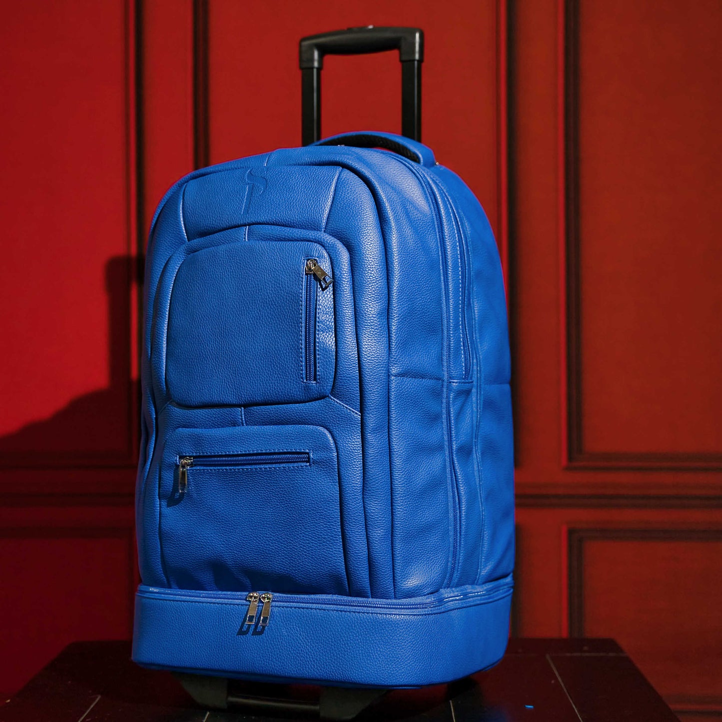 Royal Blue Leather TSA-Approved Carry-On Roller Bag Sole Premise