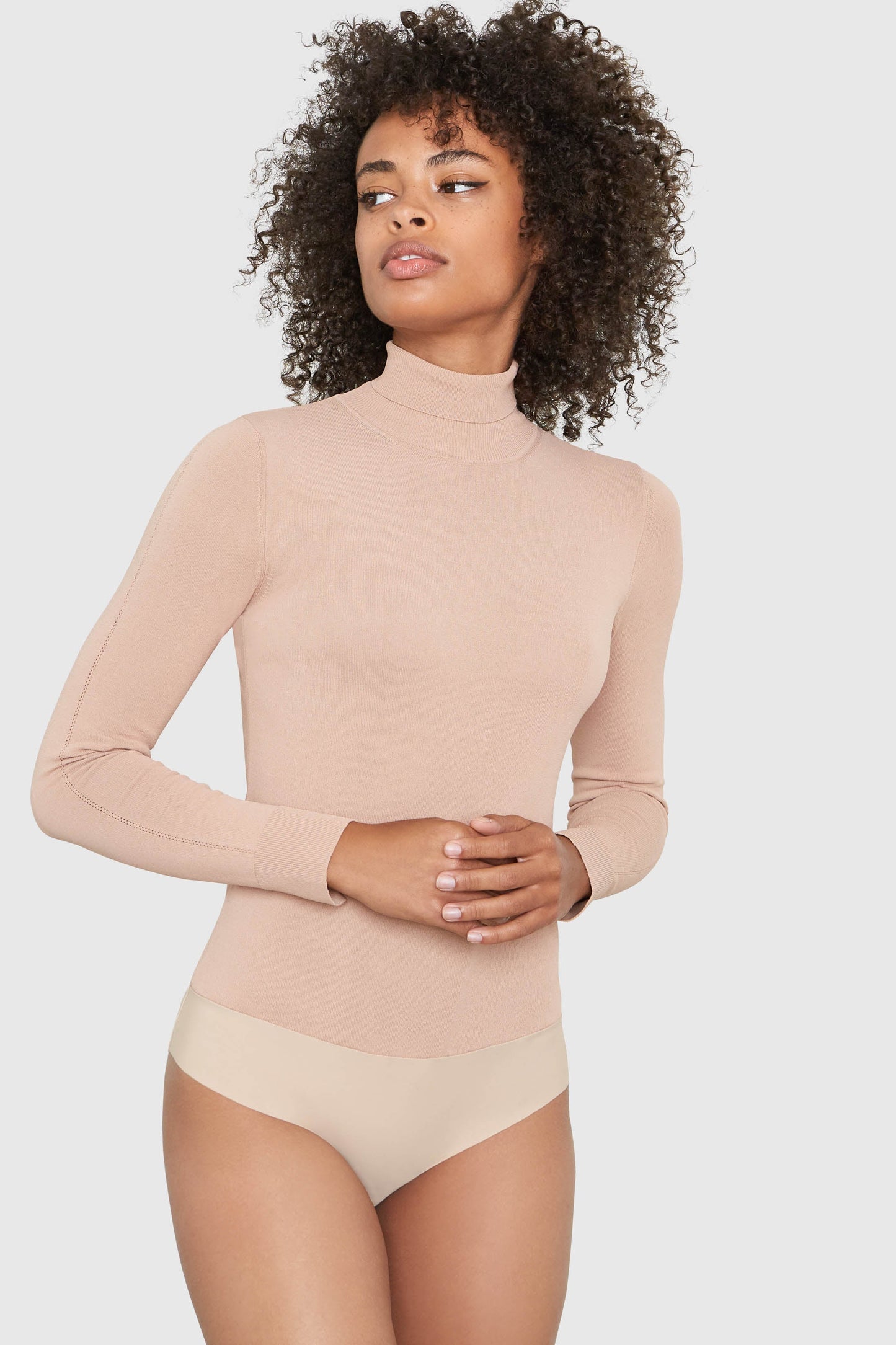MIRA TURTLENECK VISCOSE BODYSUIT IN BEIGE