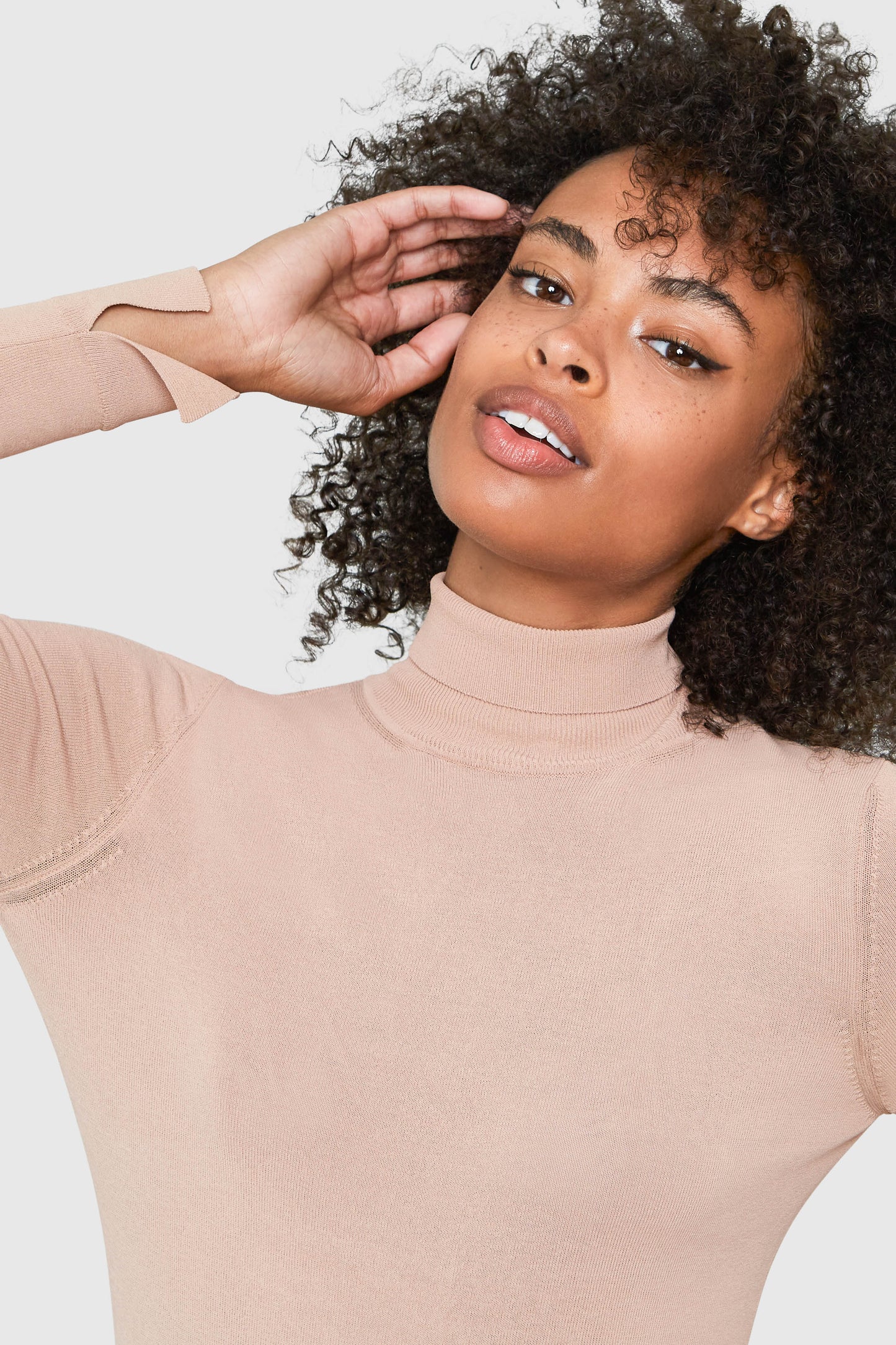MIRA TURTLENECK VISCOSE BODYSUIT IN BEIGE