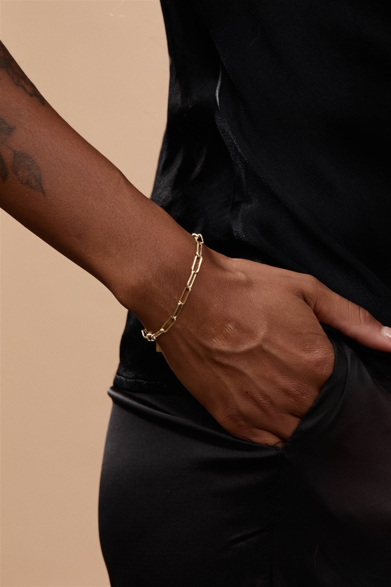 24k Gold Over Brass Elongated Paperclip Chain Bracelet The First Layer