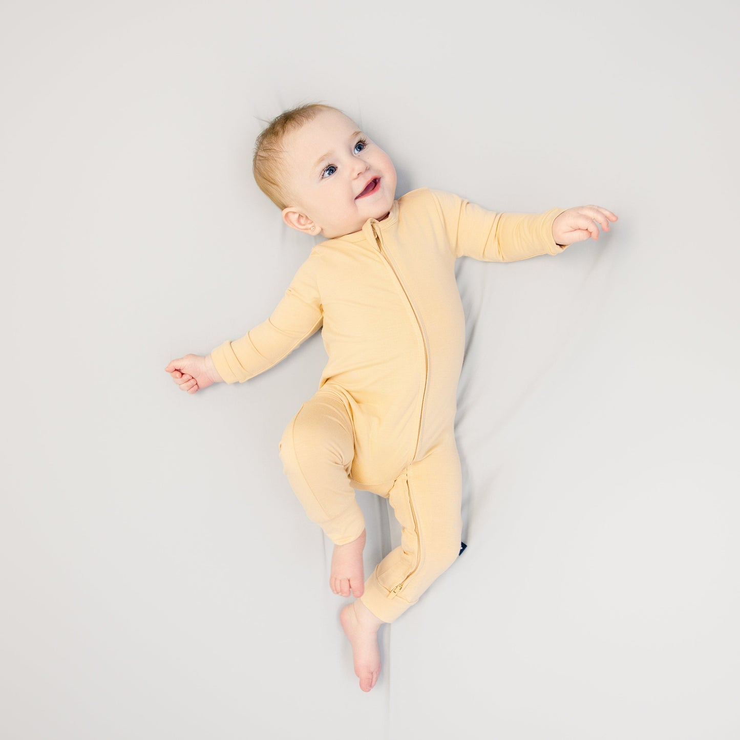 Larkspur Baby Zip Romper in Golden Sand