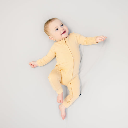 Larkspur Baby Zip Romper in Golden Sand