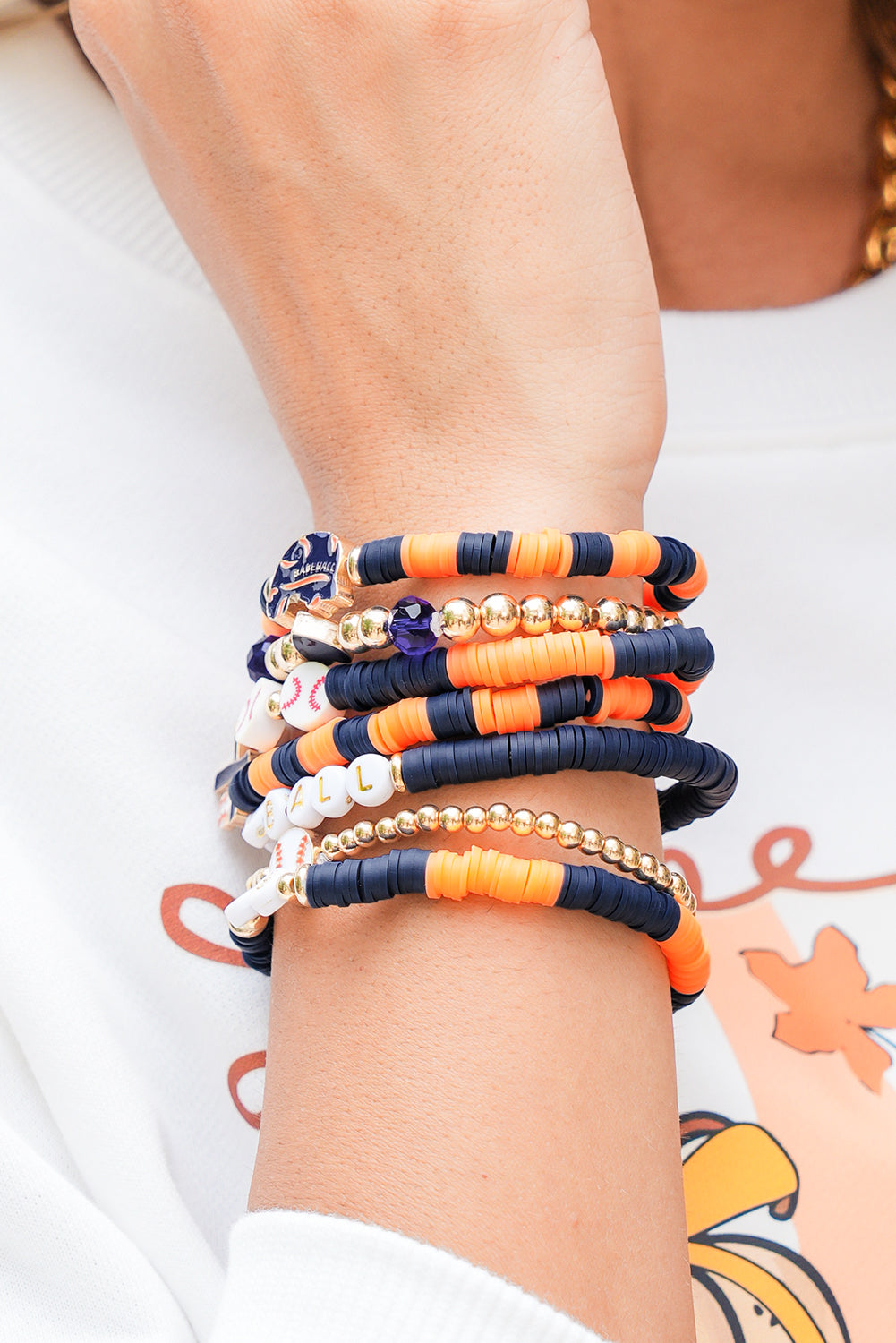 Russet Orange Stackable Football Bracelet Set 7pcs