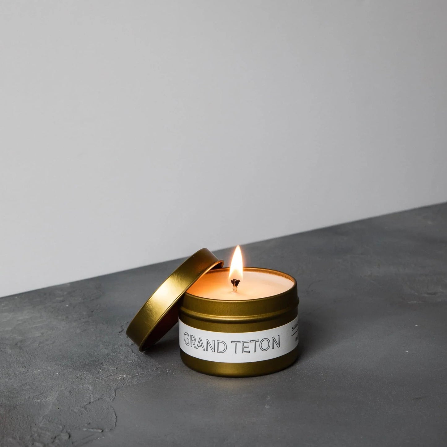 Travel Candle Woodsy Scented Grand Teton by The Roosevelts Candle Co.
