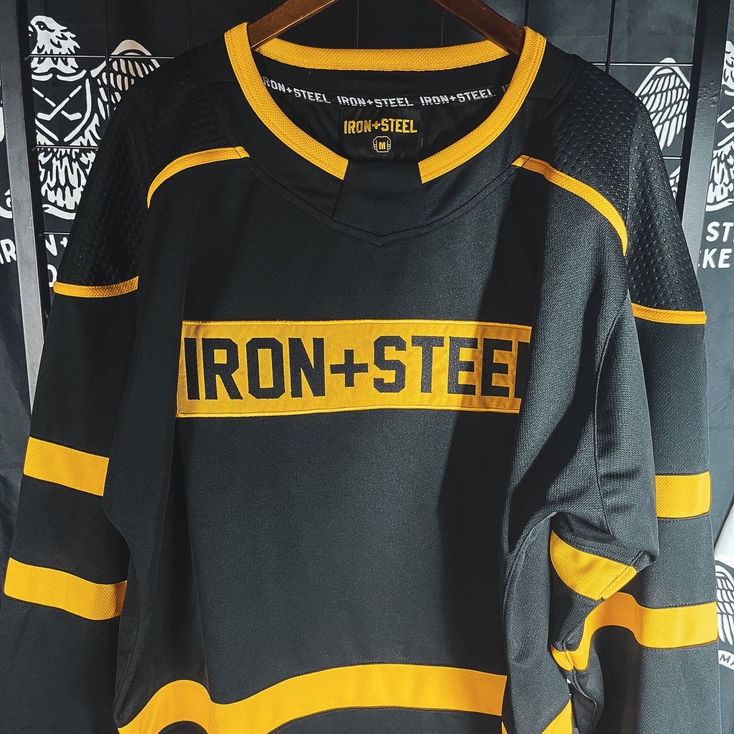 Iron+Steel Black Gold Dimpled Shoulder Hockey Jersey